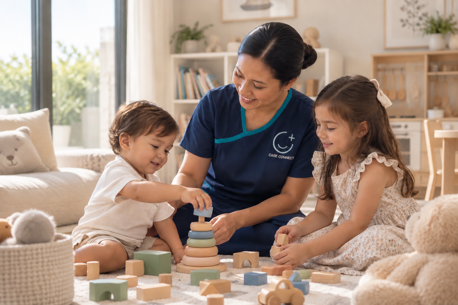A Care Connect babysitter helping a toddler stack wooden rings while a young girl plays beside them